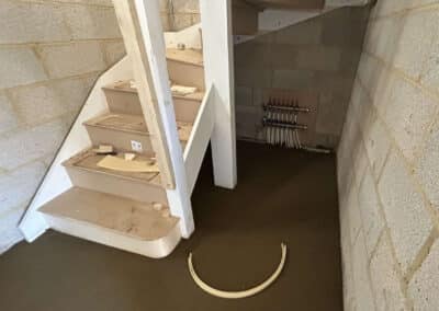 Finished floor screed near a staircase in a new build home