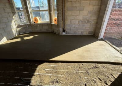 Underfloor heating screed in progress