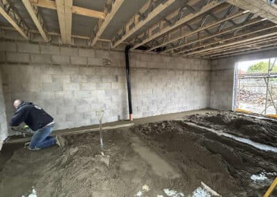 Floor screed contractor at work on a new build in Desborough