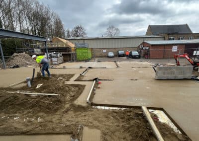 Floor screeding contractor working on a new build plot in Towcester