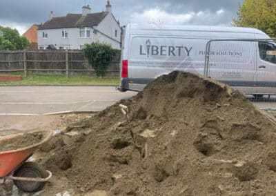 Liberty Floor Solutions van outside a new build in Desborough