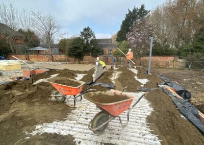 Floor screeding contractors working on a new build plot in Towcester