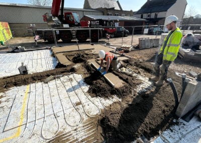 Floor screeding contractors working on a new build plot in Towcester