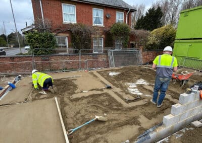 Floor screeding contractors working on a new build plot in Towcester