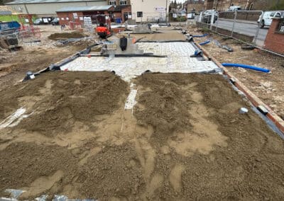 Underfloor heating screed being installed on a new build plot in Towcester, Northamptonshire
