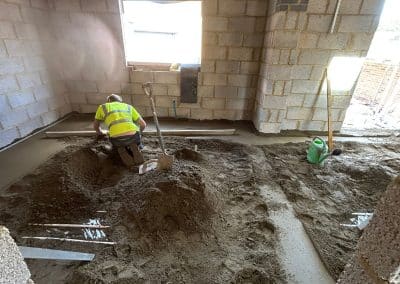 Floor screeder, working at a new build in Great Houghton, Northampton
