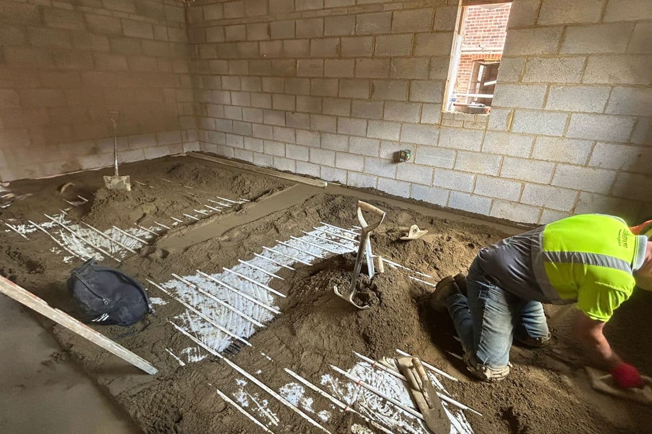 Floor screeder, working at a new build in Great Houghton, Northampton