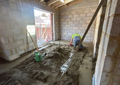 Underfloor heating screeder, working at a new build in Great Houghton, Northampton