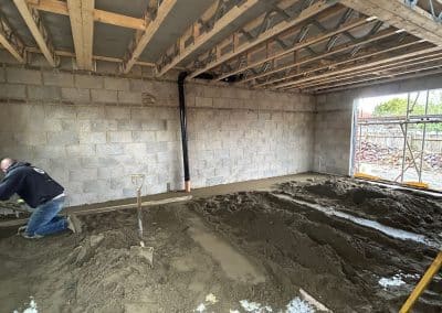 Floor screeder working at a new build in Kettering