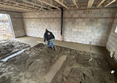Floor screeder working at a new build in Kettering