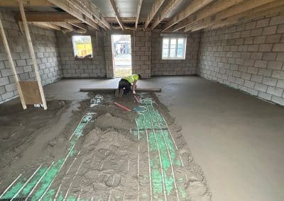 Floor screed over underfloor heating at new bungalow in St James, Northampton
