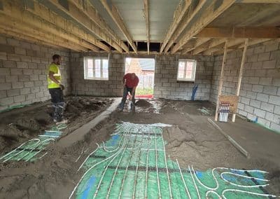 Floor screed over underfloor heating at new bungalow in St James, Northampton