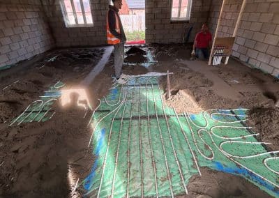 Floor screed over underfloor heating at new bungalow in St James, Northampton