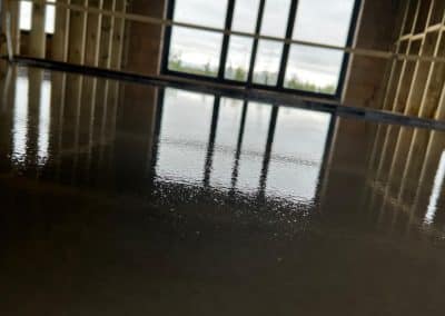 Self levelling compound at an underfloor heating installation in Peterborough