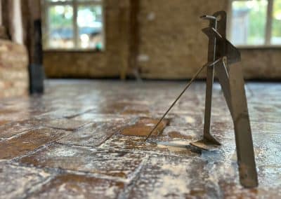 Screed spider - Steel liquid screed levelling tripod used to set the depth of the screed