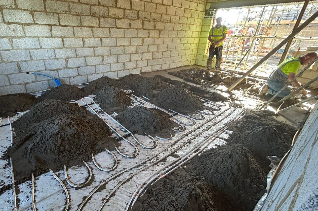 Two floor screeders working at a property in Northampton