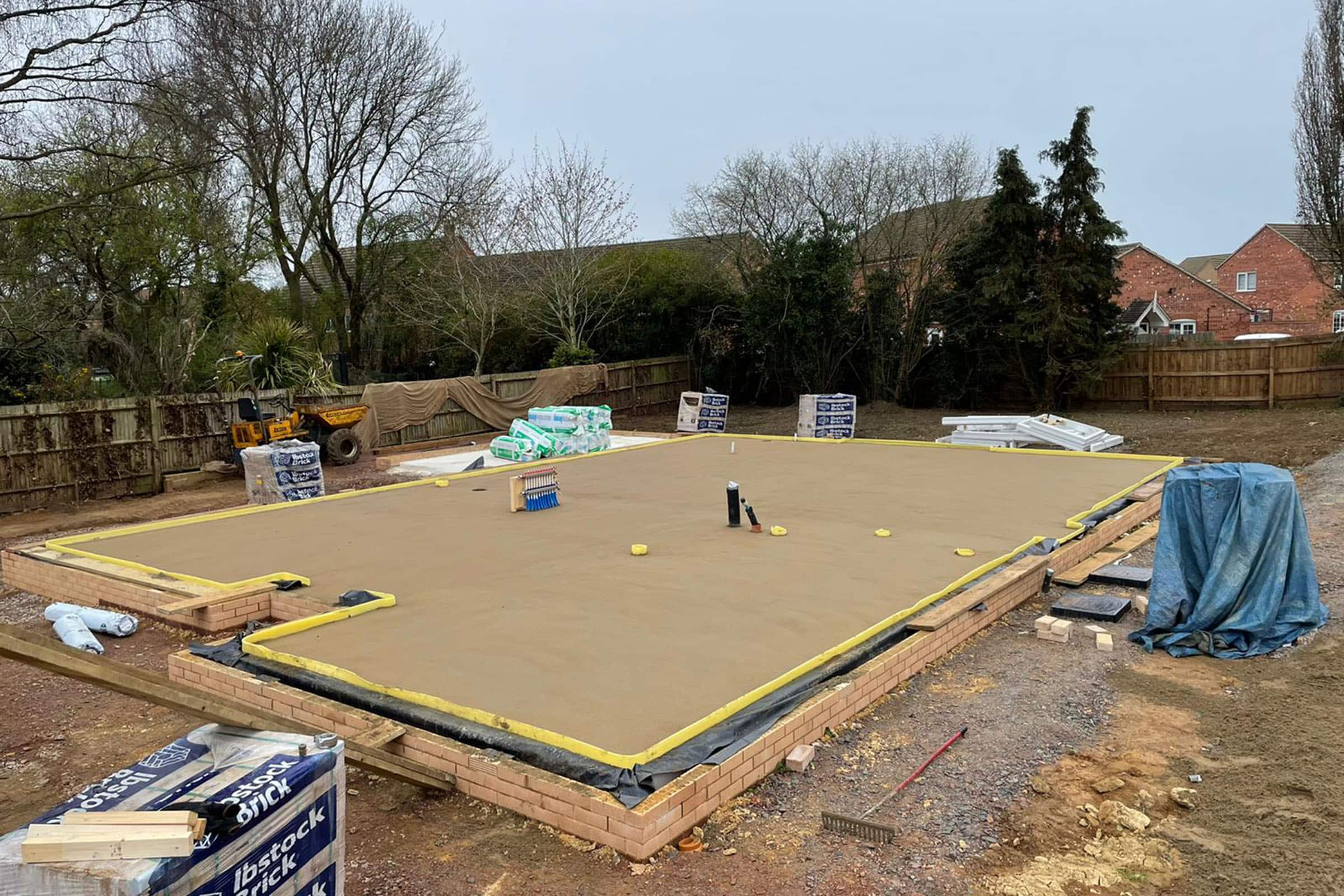 Newly installed floor screed surface on an open air new build plot