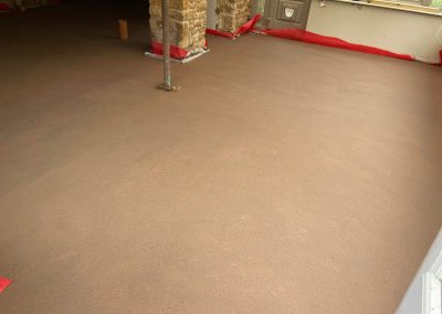 Newly installed floor screed inside a home extension in The Cotswolds