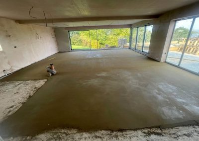 Newly installed floor screed at an open plan home extension in Northamptonshire