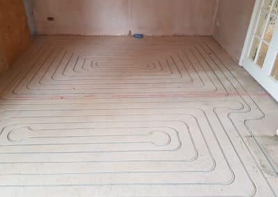 Routed underfloor heating and screed – Bedford
