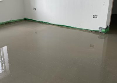 Newly installed floor screed surface at a self build project