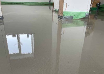 Newly installed floor screed surface at a self build project