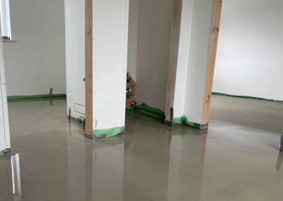 Newly installed floor screed surface at a self build project