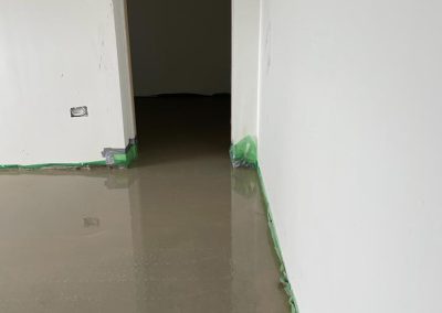 Newly installed floor screed surface at a self build project
