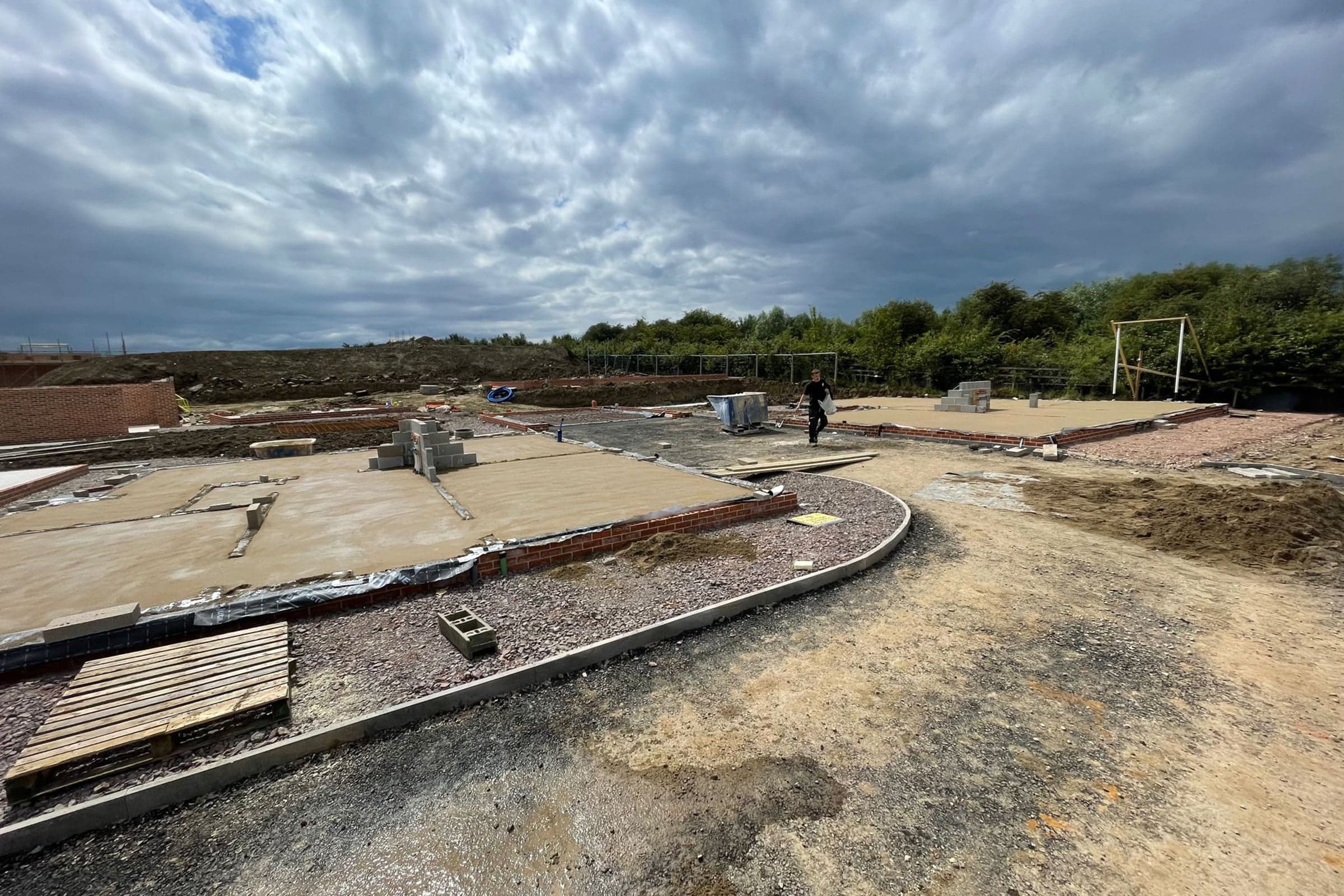 Building site showing foundations of new build properties