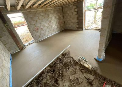 Partially installed floor screed surface at a newly build property