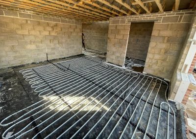 Underfloor heating pipes laid out at a new build property
